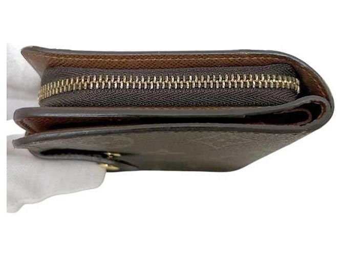 Louis Vuitton Monogram Bi-fold Wallet Braun Monogramm - Ansicht 10