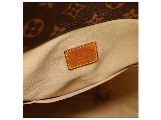 Louis Vuitton Borsa Monogram Artsy MM Marrone Monogramma - vista 10