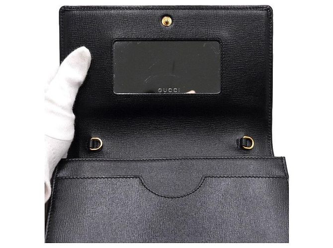 Gucci Schultertasche und Umhängetasche aus schwarzem Leder mit GG-Logo-Klappe und Goldkette - Ansicht 7