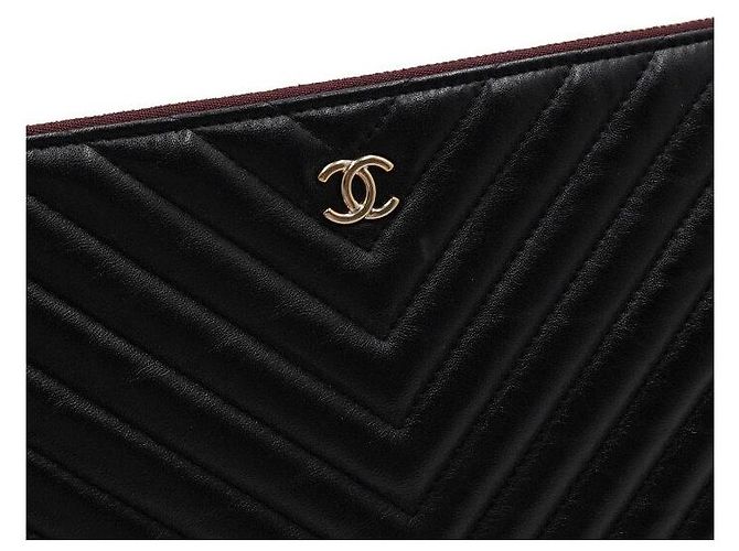 Chanel Bolso de mano grande Chevron CC en piel de cordero negra y dorada Negro - vista 10