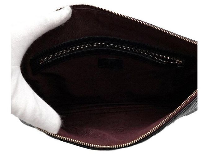 Chanel Bolso de mano grande Chevron CC en piel de cordero negra y dorada Negro - vista 6