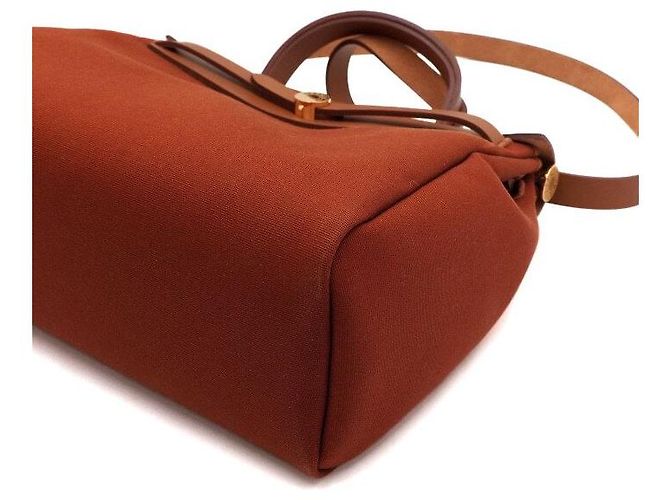 Hermès Tote e bolsa de ombro em couro laranja com ferragens - vista 11