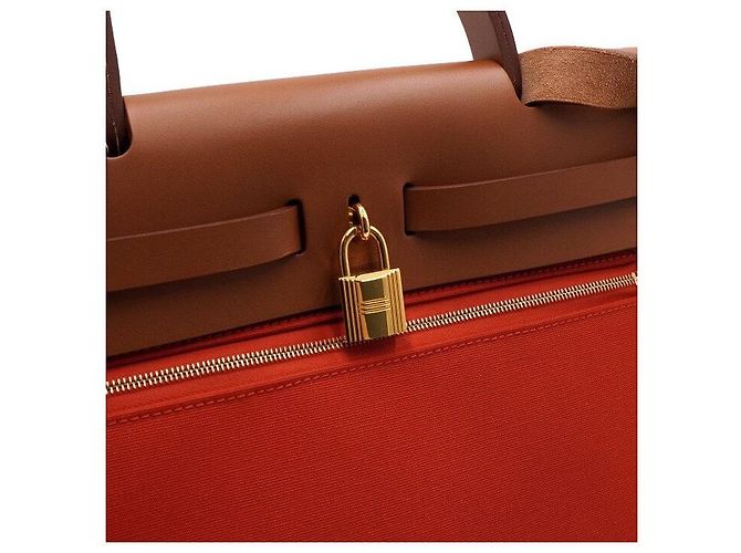 Hermès Tote e bolsa de ombro em couro laranja com ferragens - vista 14