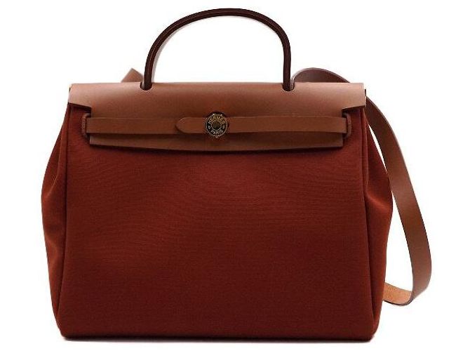 Hermès Tote e bolsa de ombro em couro laranja com ferragens - vista 2
