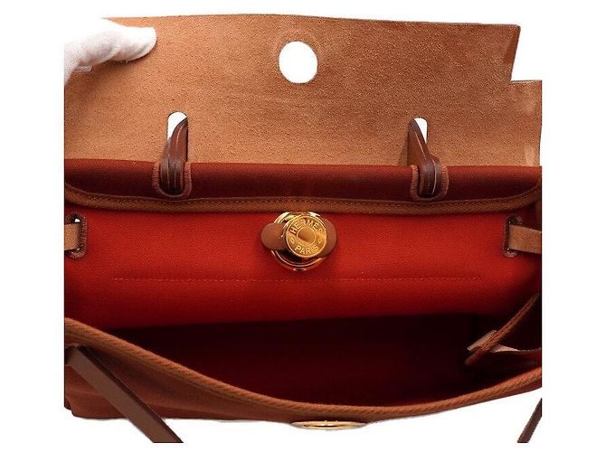 Hermès Tote e bolsa de ombro em couro laranja com ferragens - vista 7