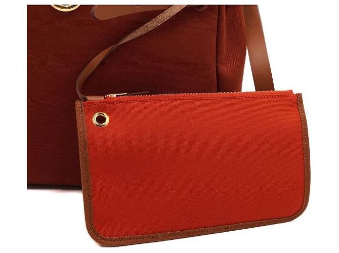 Hermès Tote e bolsa de ombro em couro laranja com ferragens - vista 9