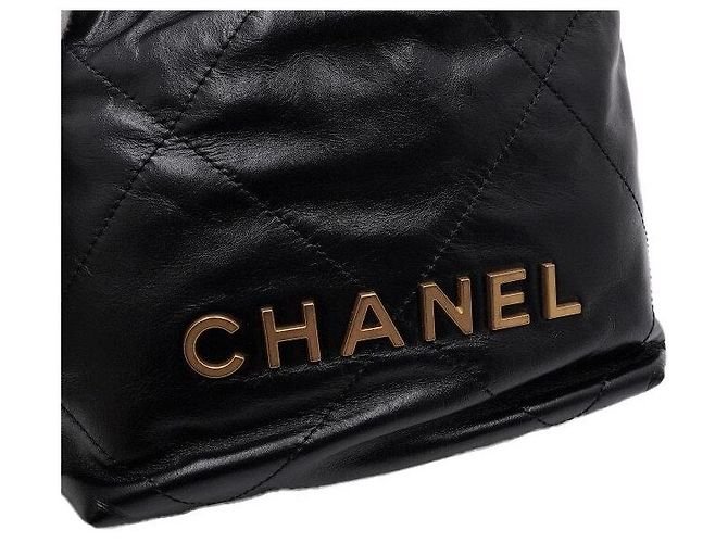 Chanel Mini sac à bandoulière et sac crossbody en métal doré Noir - vue 9