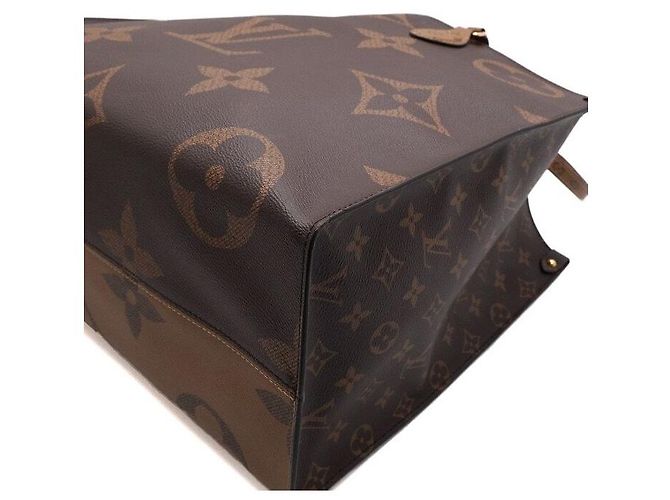 Louis Vuitton Borsa Tote OnTheGo GM Monogram Giant Canvas Nero - vista 10