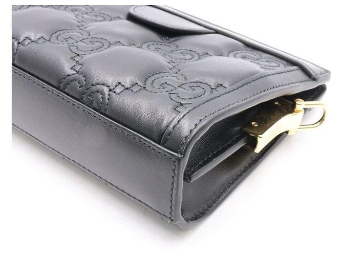 Gucci Mini bolsa de ombro e transversal em matelassé com relevo GG preto e corrente dourada - vista 5
