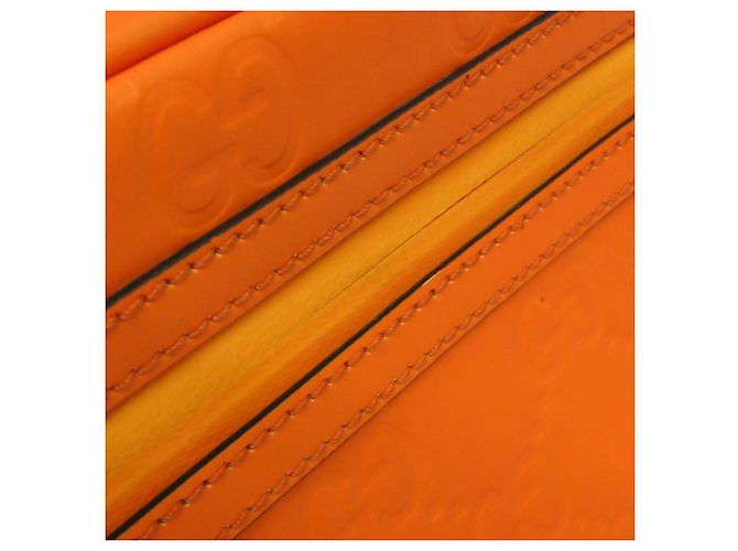 Borsa a tracolla Gucci GG con effetto gomma 771422 Arancione - vista 13
