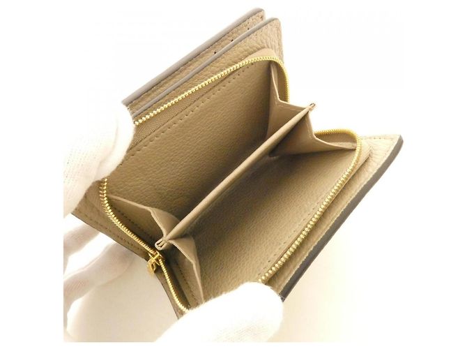 Portafoglio Louis Vuitton Bicolor Monogram Empreinte Beige Grigio - vista 5