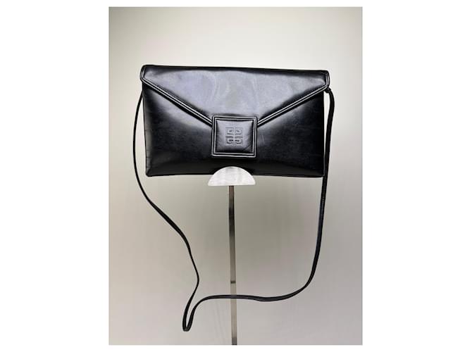 Clutch in pelle vintage Givenchy nero e oro - vista 12