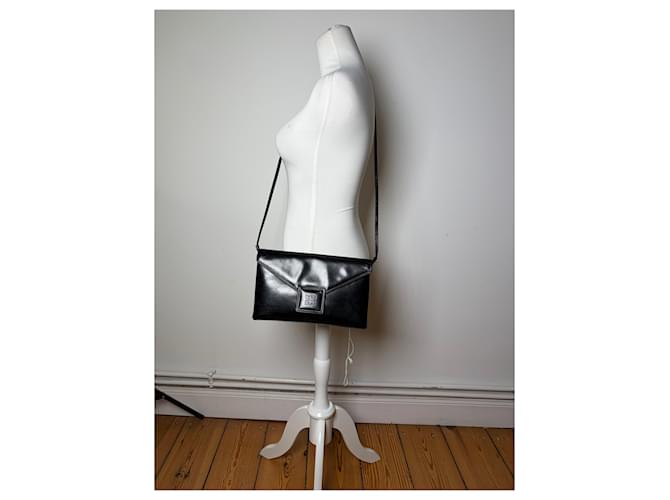 Clutch in pelle vintage Givenchy nero e oro - vista 4