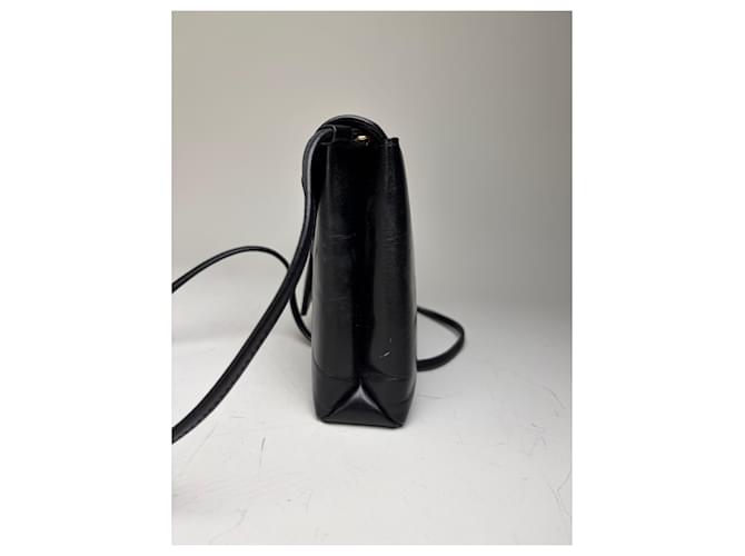 Clutch in pelle vintage Givenchy nero e oro - vista 8