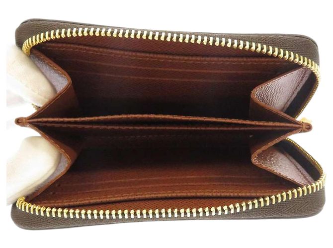 Portamonete Louis Vuitton Monogram Zippy marrone - vista 3