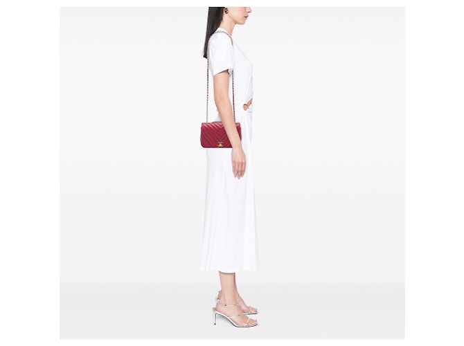 Borsa a tracolla Chanel Small Chevron Iridescent Caviar Statement Flap rossa Rosso - vista 5