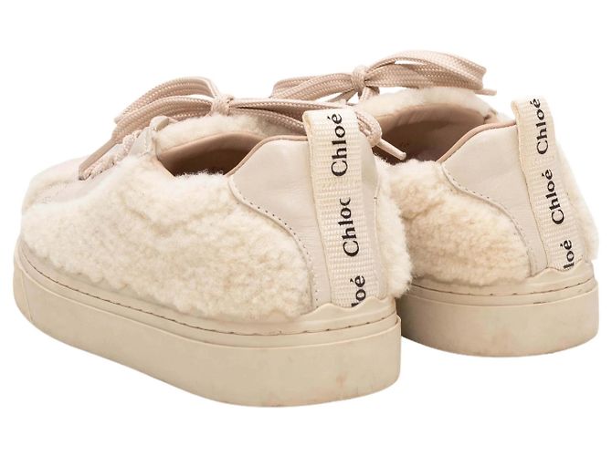 Chloé Low-Top-Sneaker aus Leder und Shearling in Creme Chloe Größe 36 Beige - Ansicht 4
