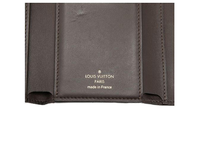 Cartera compacta Louis Vuitton Taurillon Capucines beige - vista 6