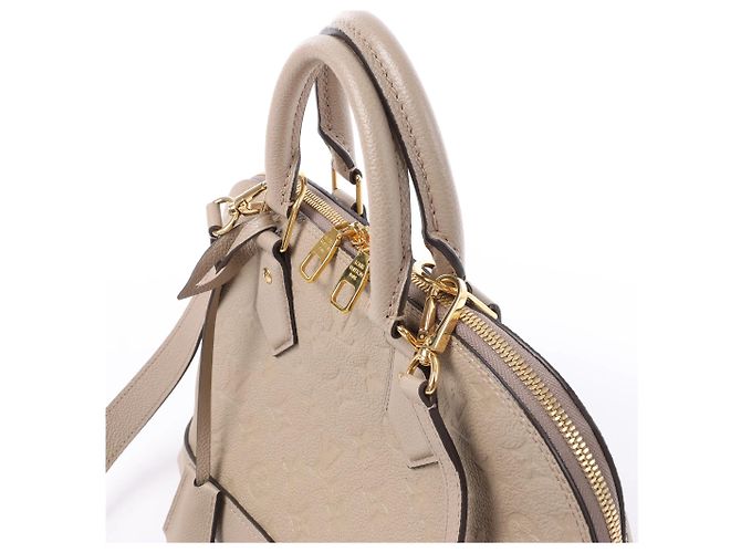 Borsa Louis Vuitton Alma PM Monogram Empreinte Neo 2Way in Beige M44885 Bordò - vista 3