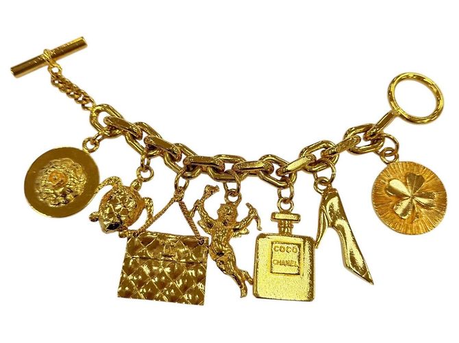 Bracciale Rigido Chanel Vintage con Ciondolo Icona in Metallo D'oro - vista 3