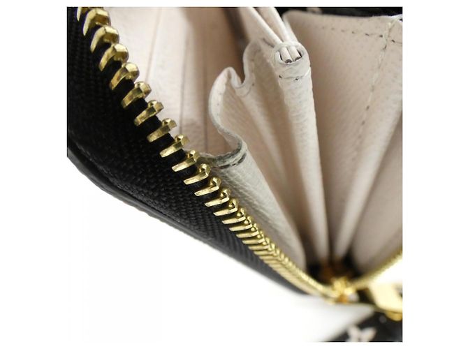 Cartera Louis Vuitton LV Crafty Zippy Crudo Caramelo - vista 6