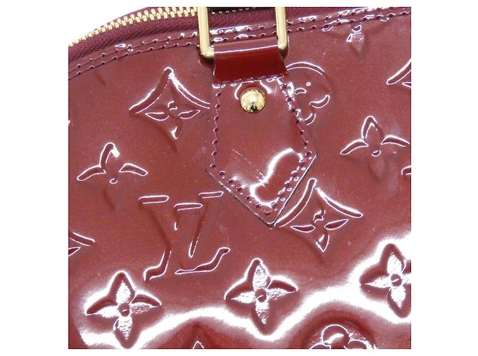 Bolsa Louis Vuitton Vernis Alma PM - vista 4