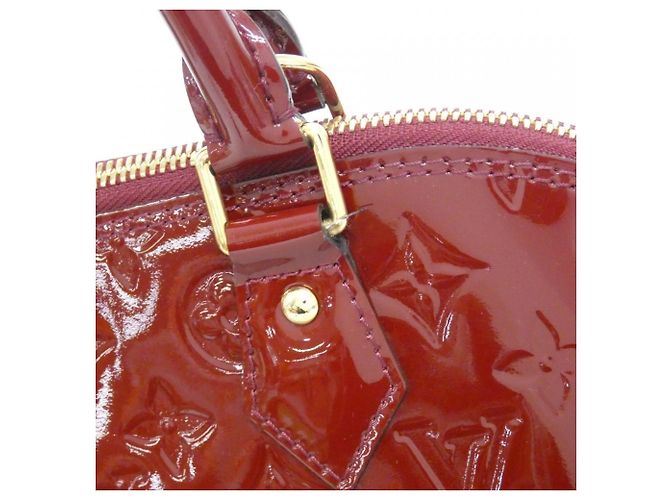 Bolsa Louis Vuitton Vernis Alma PM - vista 5