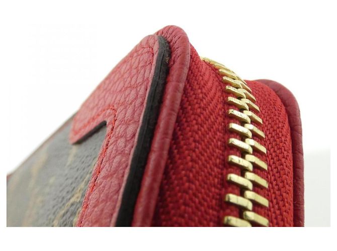 Louis Vuitton Monogram Zippy Wallet Retiro M61854 Marrone Fuschia - vista 4