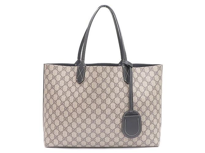 Gucci Borsa Shopper e Borsa a Tracolla Reversibili in PVC con Logo GG Marrone - vista 10