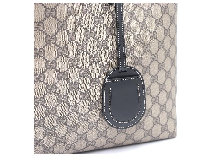 Gucci Borsa Shopper e Borsa a Tracolla Reversibili in PVC con Logo GG Marrone - vista 14