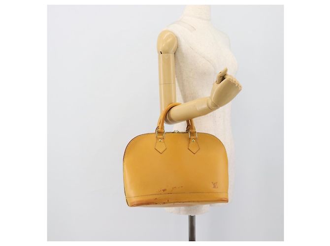 Sac à main Alma en cuir Nomad LOUIS VUITTON Beige M85000 LV Auth 194592V - vue 22