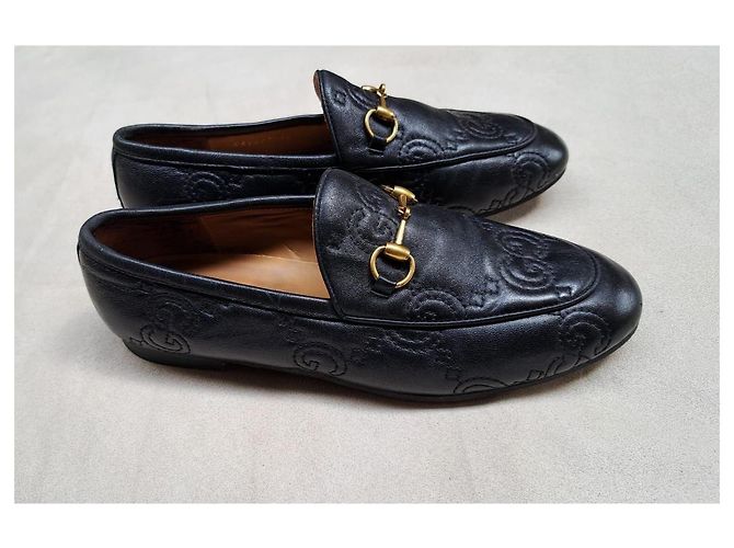 Mocassini Gucci in pelle nera con logo GG in rilievo Nero - vista 3