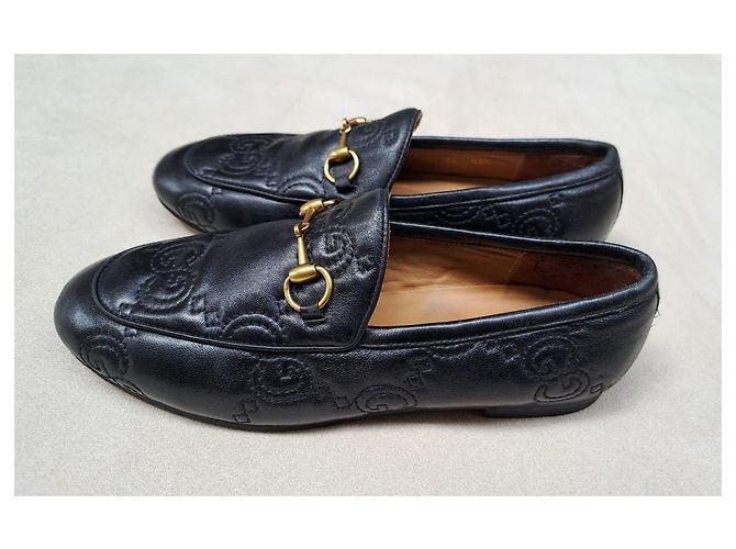 Mocassini Gucci in pelle nera con logo GG in rilievo Nero - vista 4