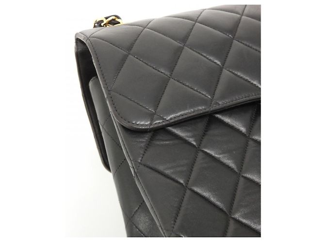 Sac à épaule Chanel 06303 en cuir noir - vue 4