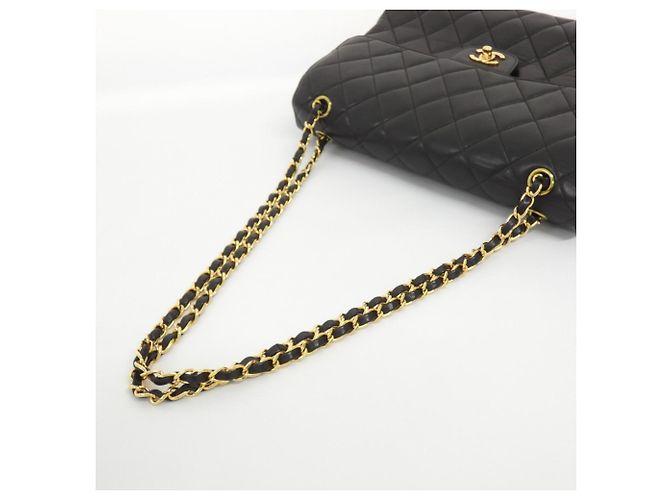 Sac à épaule Chanel 06303 en cuir noir - vue 5