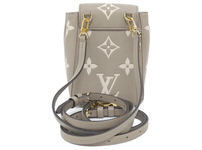 Zainetto Louis Vuitton Bicolor Monogram Empreinte Tiny Backpack Grigio Crudo - vista 2