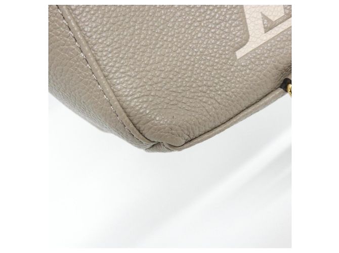Zainetto Louis Vuitton Bicolor Monogram Empreinte Tiny Backpack Grigio Crudo - vista 4