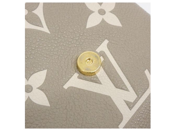 Zainetto Louis Vuitton Bicolor Monogram Empreinte Tiny Backpack Grigio Crudo - vista 6
