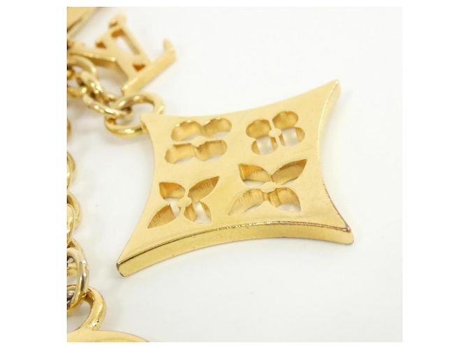 Charm per borsa Louis Vuitton Portachiavi Ivy D'oro - vista 3