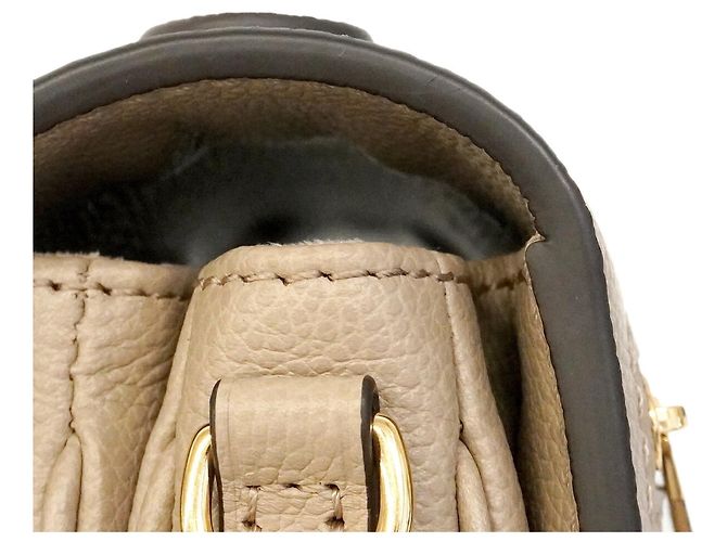 Borsa Louis Vuitton Monogram Empreinte Bicolor Pochette Métis EW Crudo - vista 7