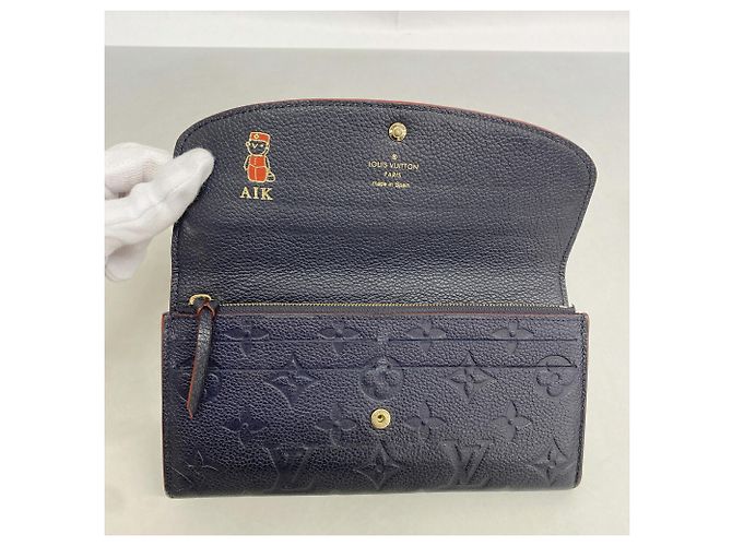 Louis Vuitton Monogram Empreinte Portefeuille Emilie Long Wallet Rosso - vista 3