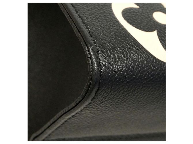 Borsa Tote Louis Vuitton Monogram Empreinte Bicolor OnTheGo MM Nero Beige - vista 6