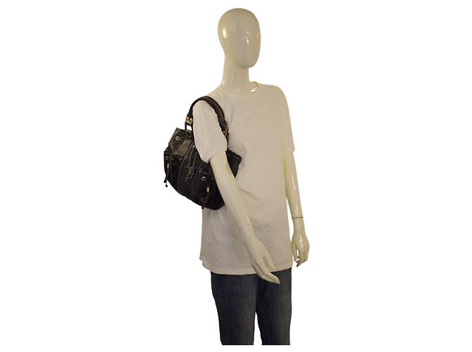 Autre Marque Borsa a tracolla TOUS in pelle nera goffrata con orso, coulisse e tasche multiple Nero - vista 18