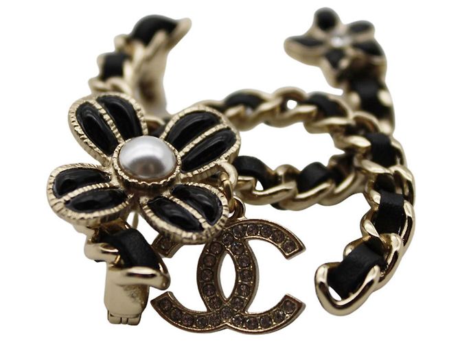 Broche Chanel preta e dourada com strass Preto Dourado - vista 3