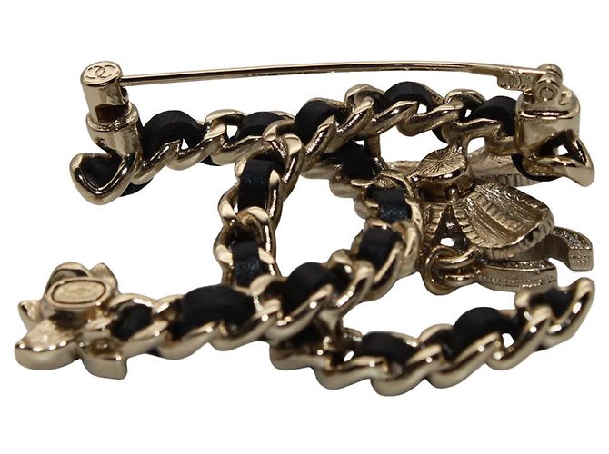 Broche Chanel preta e dourada com strass Preto Dourado - vista 5