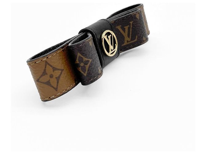 Fermi capelli Louis Vuitton LV Circle My Bow Ribbon Marrone D'oro - vista 4