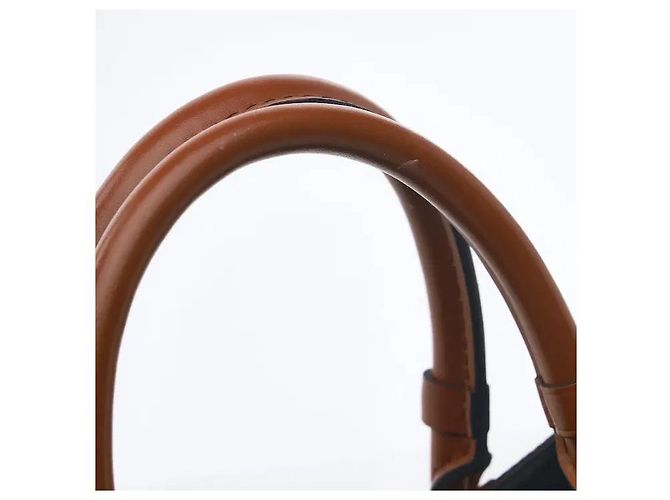 Louis Vuitton A timepiece bag harmonizing a classic Monogram pattern with a luxurious handle. Despite its compact BB size, it has ample interior storage for efficiently keeping daily belongings. Sturdy canvas Brown - view 7
