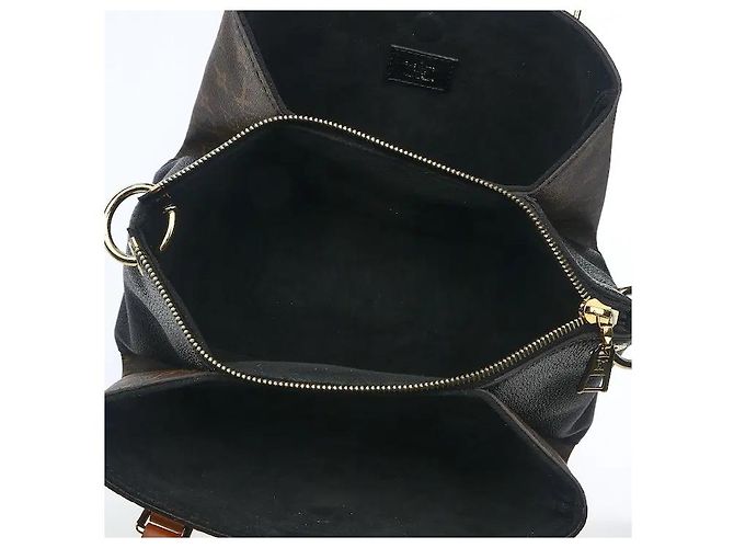 Louis Vuitton A timepiece bag harmonizing a classic Monogram pattern with a luxurious handle. Despite its compact BB size, it has ample interior storage for efficiently keeping daily belongings. Sturdy canvas Brown - view 8