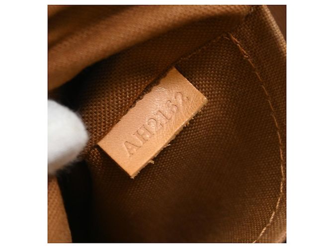 Louis Vuitton Tivoli Monogram PM Marrone - vista 5