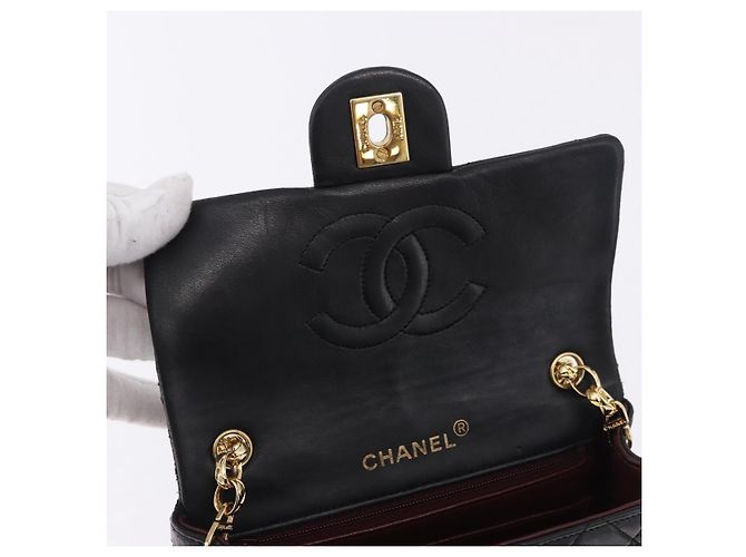 Borsa a tracolla CHANEL Chain Mini Matelasse in pelle d'agnello nera e oro CC Auth 195391SAV Nero D'oro - vista 17